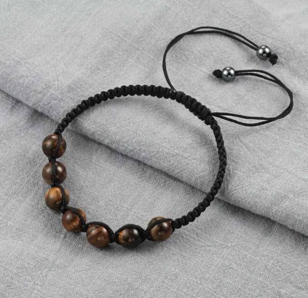 Zapestnica iz makrame vrvice in tigrovega očesa - črna 4864